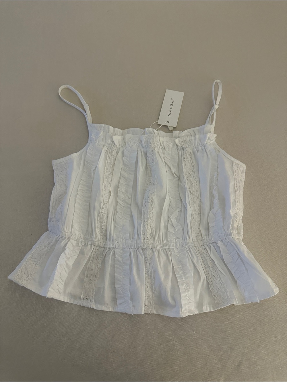Sleeveless White Ruffle Lace Peplum Top